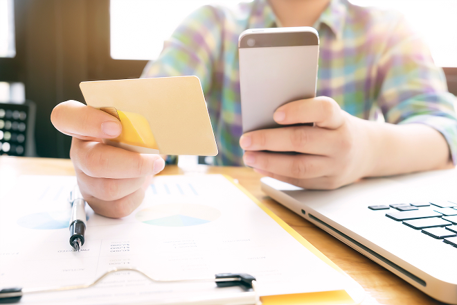 woman-using-laptop-mobile-phone-online-shopping-pay-by-credit-card 1 (1).jpg